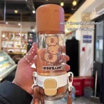 580ml Tritan Cute Capybara Space Cup with Hand-held Ring BPA-Free Portable Camper Water Bottle with Straw and Strap Juice Cup - Image 6